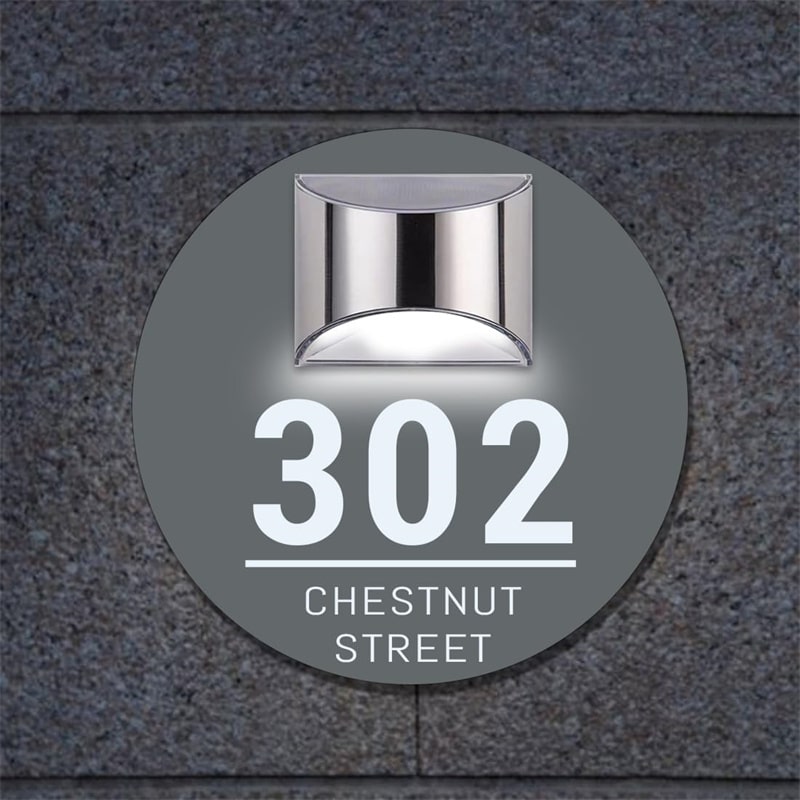 Close-up of the UV-printed textured details on the round door plaque