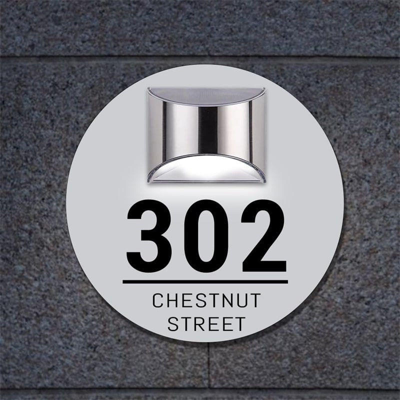 Round acrylic plaque with floating effect mounted on a wall
