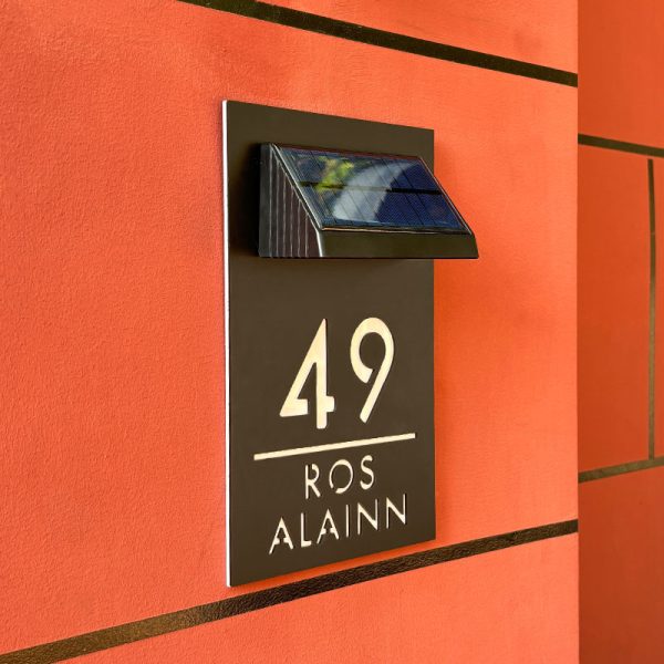 Custom solar laser-cut house sign with 100-lumen LED