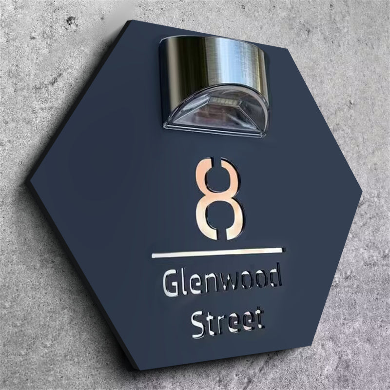 Hexagonal solar house plate glowing at night with brushed aluminum solar light