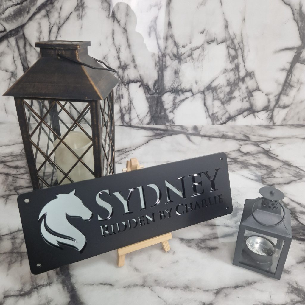 Black laser-cut personalized horse stable name plaque