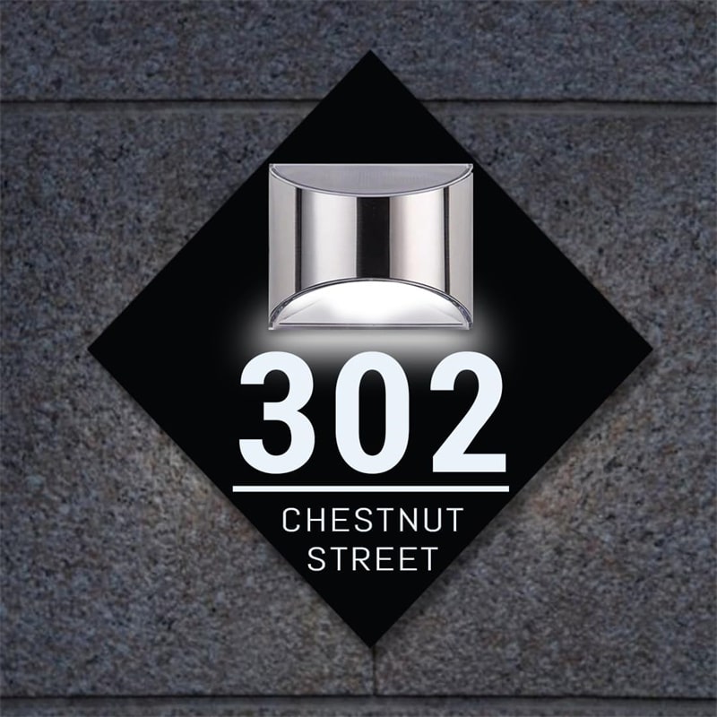 UV-printed solar house number sign plaque on a front door