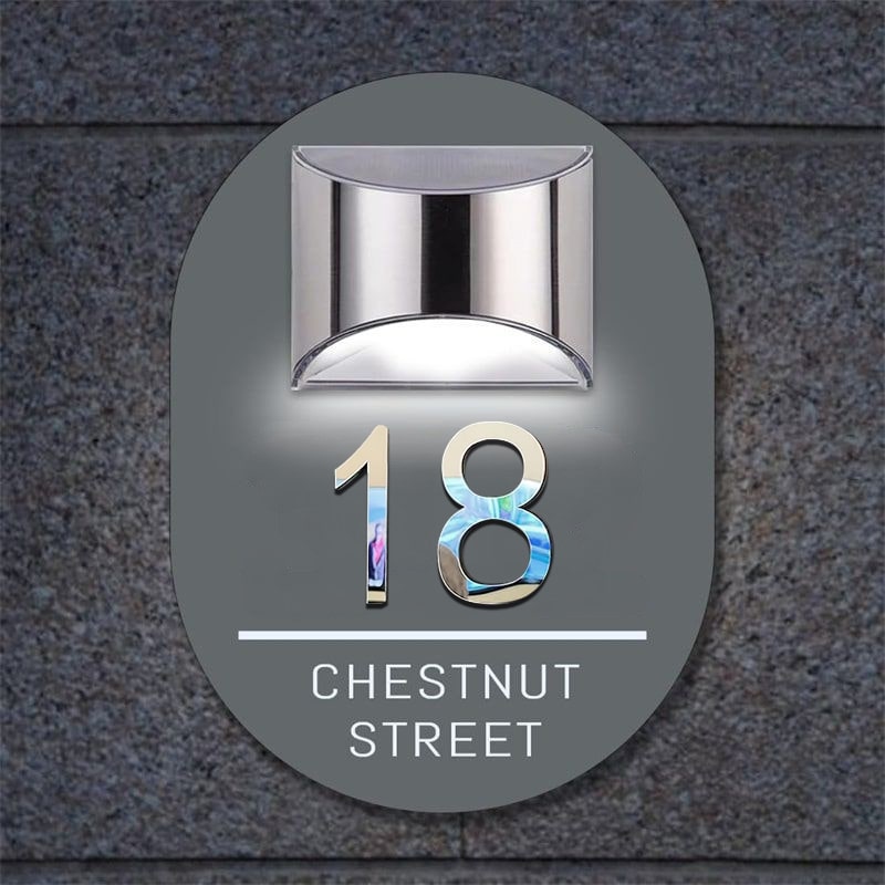 Custom door number and street name on the oval solar plaque
