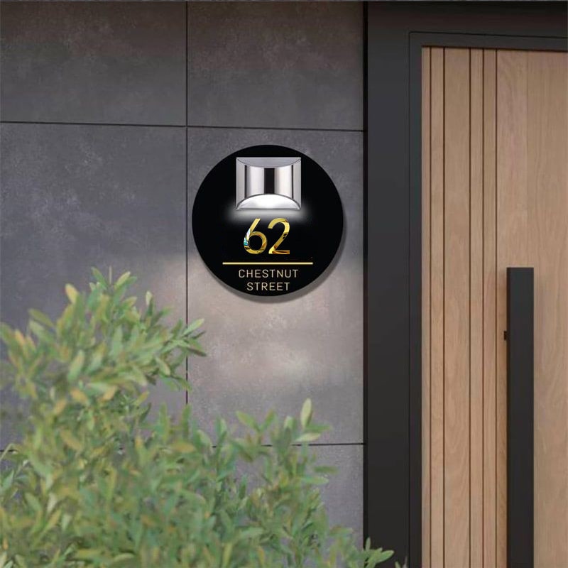 Personalized round solar 3D house number sign on a door